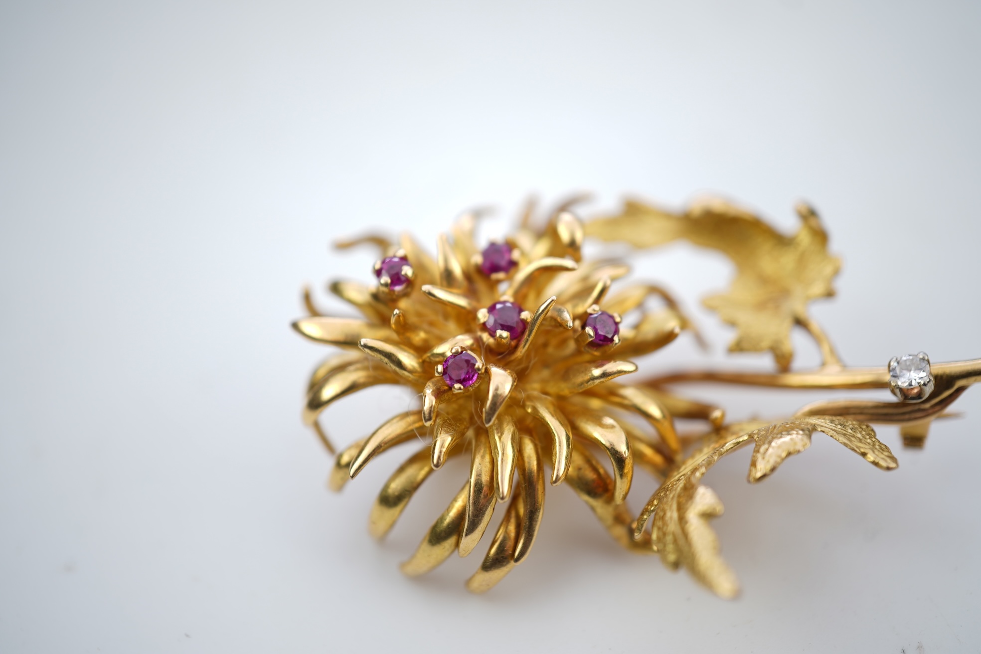 Ben Rosenfeld, a gold and ruby brooch, circa 1977